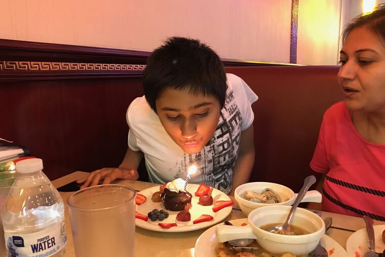 Areen Chakrabarti, shown here celebrating a recent birthday with his mother, Rumpa Banerjee, has died.