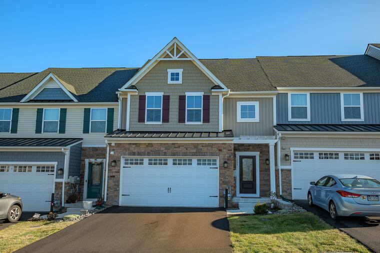 The three-bedroom, 3½-bath house is almost 4,000 square feet and is in the Overlook Townhome Community.