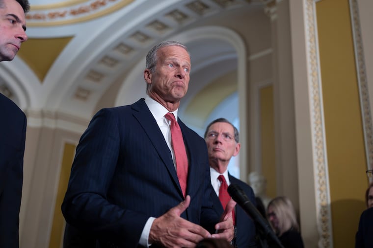 Senate Majority Leader John Thune, R-S.D., flanked by Sen. Tom Cotton, R-Ark., left, and Sen. John Barrasso, R-Wyo., speaks to reporters following a closed-door party meeting, at the Capitol in Washington, Tuesday, April 21, 2026.