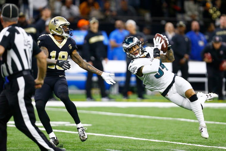 Eagles cornerback Cre'von LeBlanc intercepts the ball in January's playoff loss to the Saints. LeBlanc is due back after an injury on Sunday against the Dolphins.