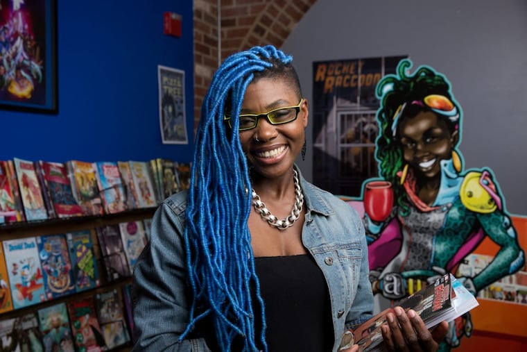 Ariell R. Johnson at her comic book store and coffee shop in Kensington, the store is called Amalgam Comics & Coffee Shop, on 2578 Frankford Ave. in Philadelphia, Friday December 23, 2016.