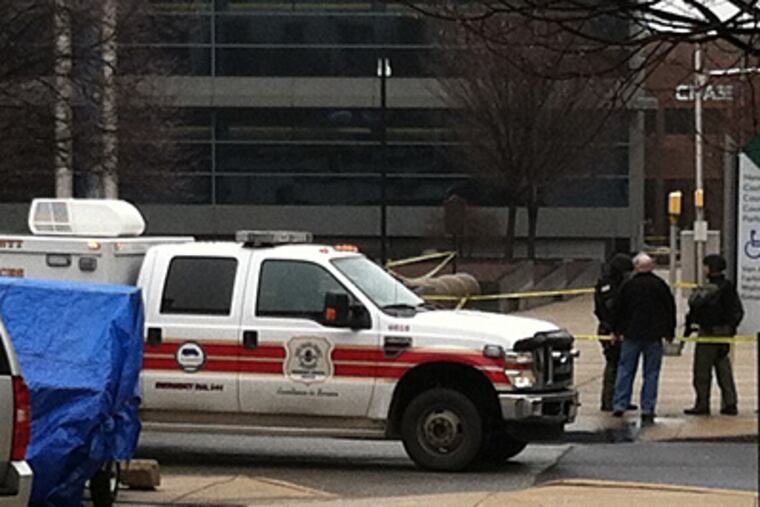 Emergency crews are on the scene of a shooting at the New Castle County Courthouse in Wilmington. Police say five people were shot, leaving three dead. (Mari A. Schaefer / Inquirer)