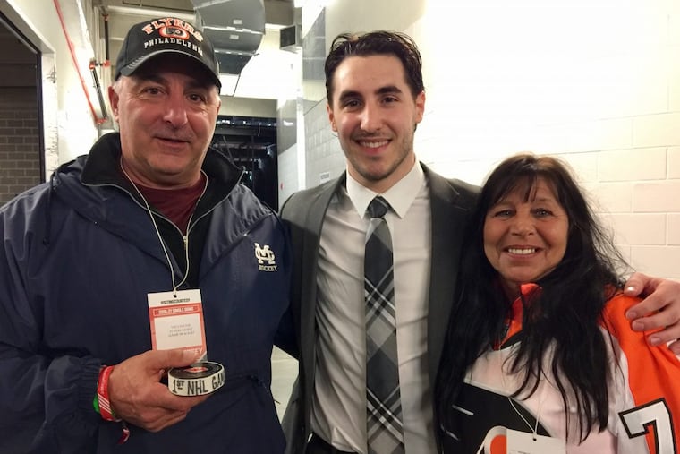Flyers prospect Mike Vecchione (center) with his father Joe (left) and Diane (right).