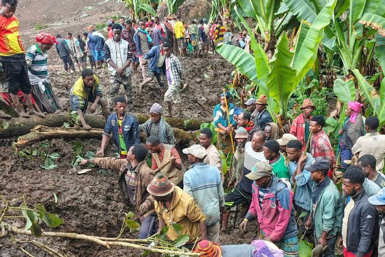 Locals search for the bodies of mudslide victims in the Gacho Baba district of the Gamo Zone in southern Ethiopia on Tuesday, March 10, 2026.