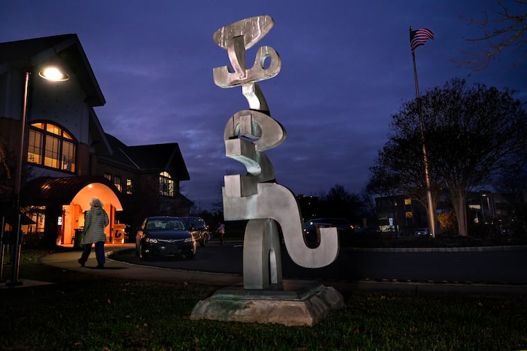 Visitors sometimes wonder about the meaning of an abstract sculpture at the Cherry Hill Public Library.