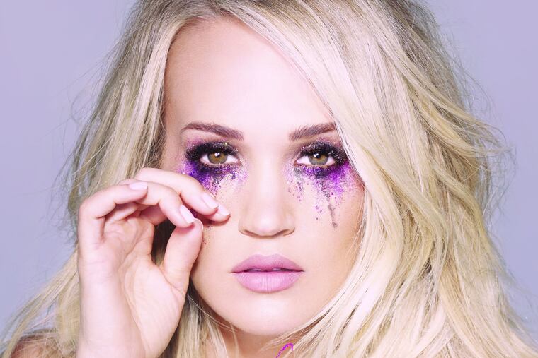 This cover image released by Capitol Records Nashville shows "Cry Pretty," a release by Carrie Underwood.