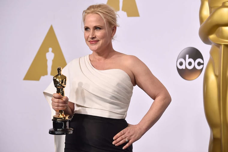 Patricia Arquette with her Oscar for best supporting actress in "Boyhood," a movie 12 years in the making. In her acceptance speech, she called for wage equality for women.