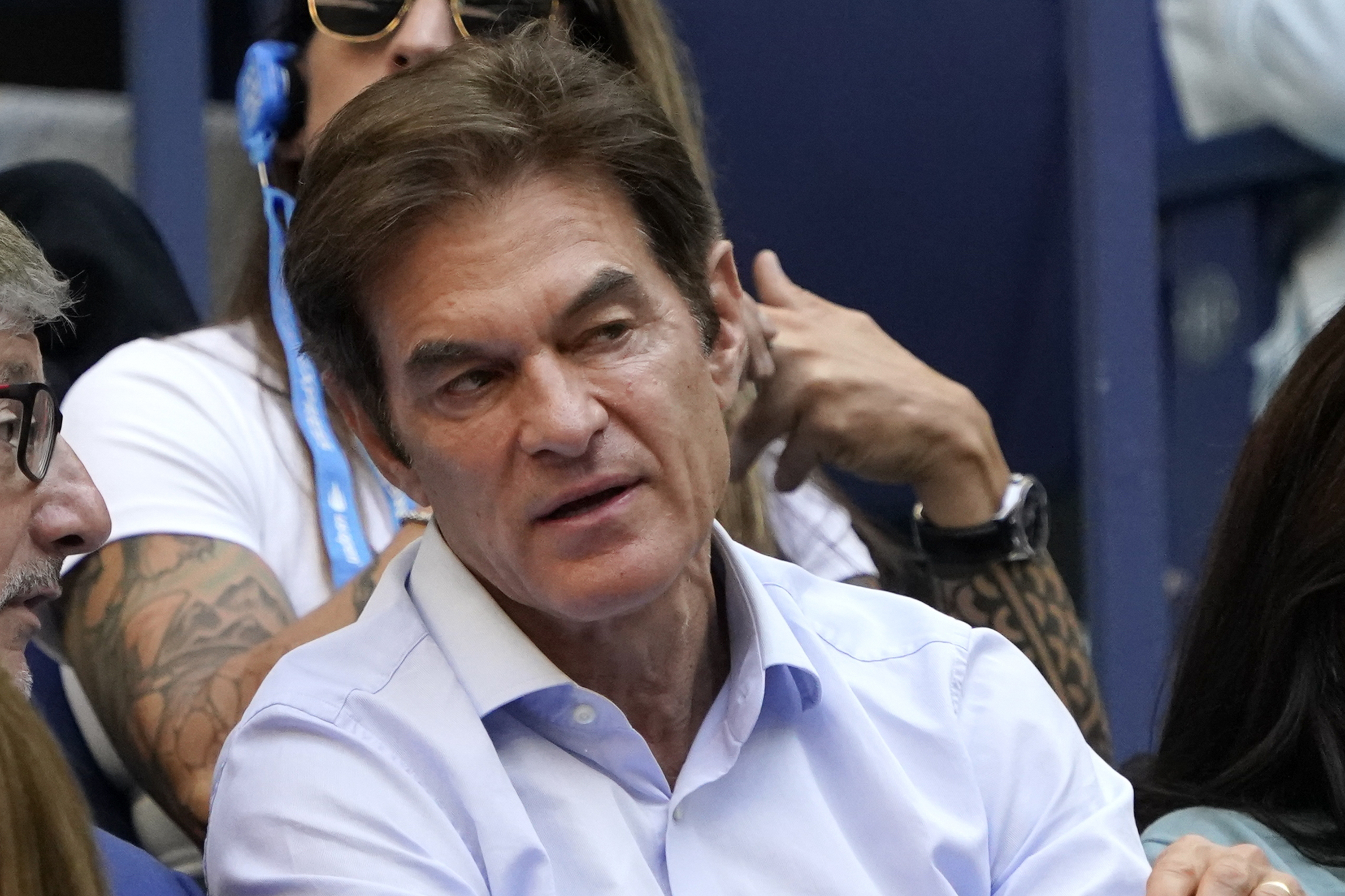 Mehmet Oz watches play during the women's singles final of the U.S. Open tennis championships, in this file photo from last year.
Oz is running in the wide-open race for the Pennsylvania seat being vacated by two-term Republican Sen. Pat Toomey.