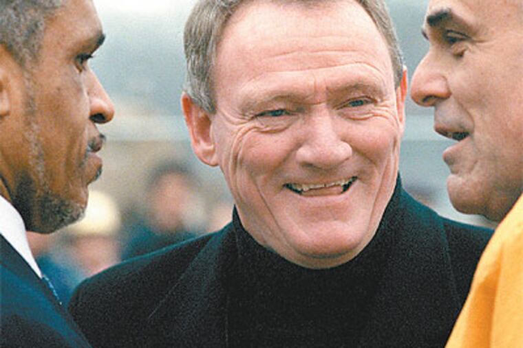 Police Commissioner John Timoney (center), Mayor-elect John Street (left) and Mayor Ed Rendell chat at the 2000 Mummers Parade. (David Maialetti / Staff Photographer)