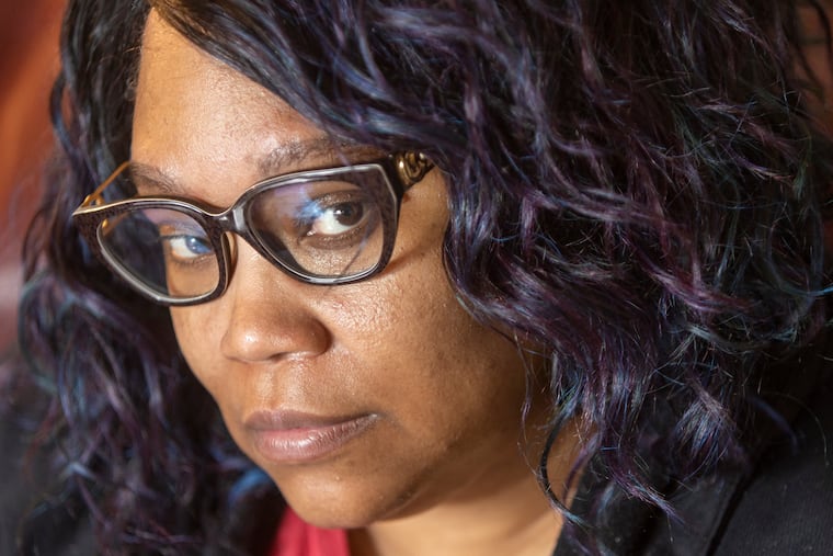 Angela Sutton, 46, at her home in Northeast Philadelphia. She has been unable to work consistently because of difficulties related to a gunshot wound she suffered as a teenager. She is believed to be eligible for Supplemental Security Income (SSI), but she has to apply in person at a Social Security office, and they've been closed to two years.