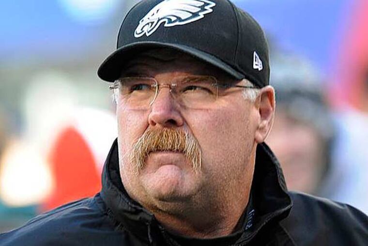 Andy Reid walks on the field before an NFL football game against the New York Giants, Sunday, Dec. 30, 2012, in East Rutherford, N.J. (Bill Kostroun/AP)