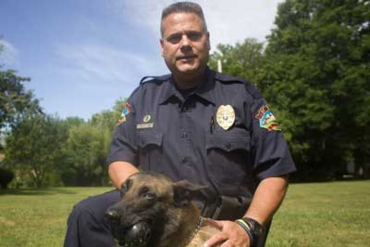 Police Chief Curt Martinez says Bouc has already apprehended a bank robbery suspect, completed preventive bomb sweeps, and assisted U.S. marshals with a warrant roundup. (Ed Hille / Staff)