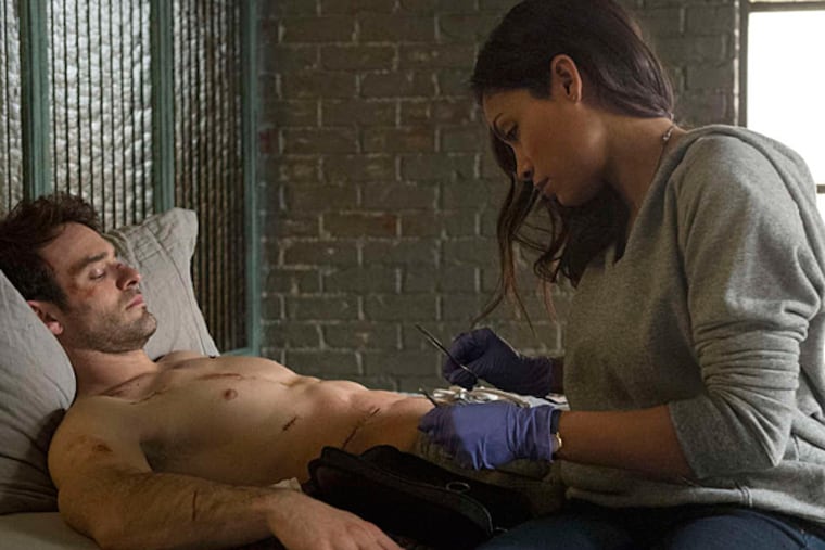 As Claire Temple , Rosario Dawson exudes confidence both professional and sexual as a nurse who periodically tends to Cox's Matt Murdock. (BARRY WETCHER / Netflix)