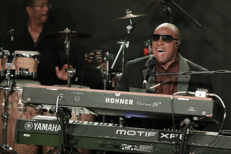 Stevie Wonder performs during a pop up concert, in support of Hillary Clinton, at CODA.