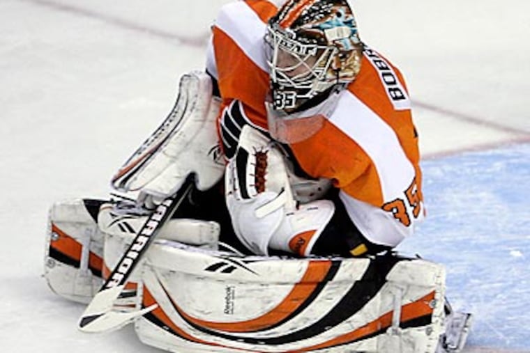 Sergei Bobrovsky was pulled on Tuesday night after allowing three goals on nine shots. (Yong Kim/Staff Photographer)