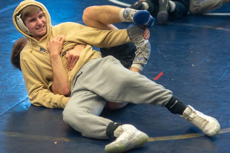Council Rock South Kyle Waterman practices with teammate Braden Ricchini.
