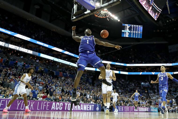 Zion Williamson dunks during the semifinals of the ACC Tournament, his first action since suffering a knee injury in February.