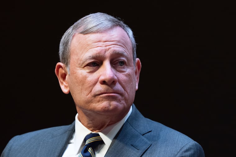 John Roberts, Chief Justice of the U.S. Supreme Court, speaks during lecture to the Georgetown Law School graduating class of 2025, in Washington, May 12, 2025.