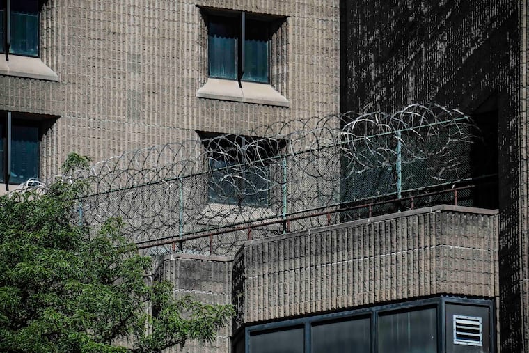 A razor wire fencing is shown on a section of the Metropolitan Correctional Center in New York, Aug. 10, 2019.