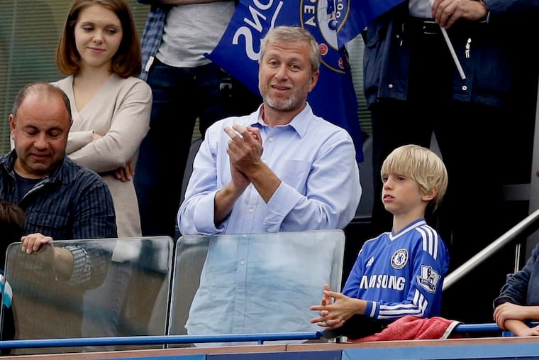 Chelsea's owner Roman Abramovich (center) at Stamford Bridge for a game in May 2015.