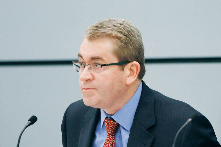 Chairman Bill Green calls for the vote of the School Reform Commission that canceled the contract with the Philadelphia Federation of Teachers. October 6, 2014. ( MICHAEL S. WIRTZ / Staff Photographer )