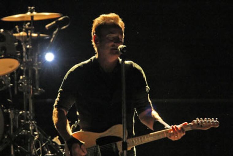 Bruce Springsteen sings during the first of his four final concerts at the Spectrum. The final show is tonight. ( Steven M. Falk / Staff Photographer )