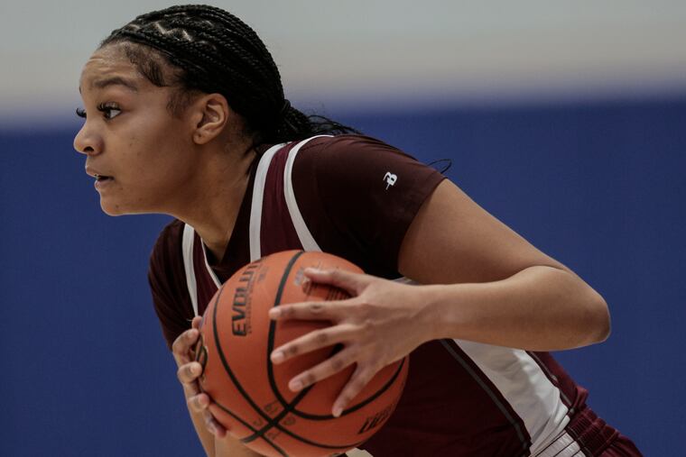 Abington's Cire Worley looks to pass during a game against Penn Charter in December. Worley will continue her basketball career at UMass Lowell.