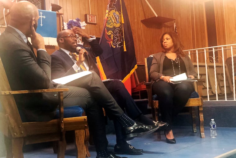 From left, Harrison Floyd and Paris Dennard of President Donald Trump's reelection campaign black voter outreach effort and Kamilah Prince, the Republican National Committee's director of African American engagement participate in a "Black Voices for Trump" event at Philadelphia's First Immanuel Baptist Church.