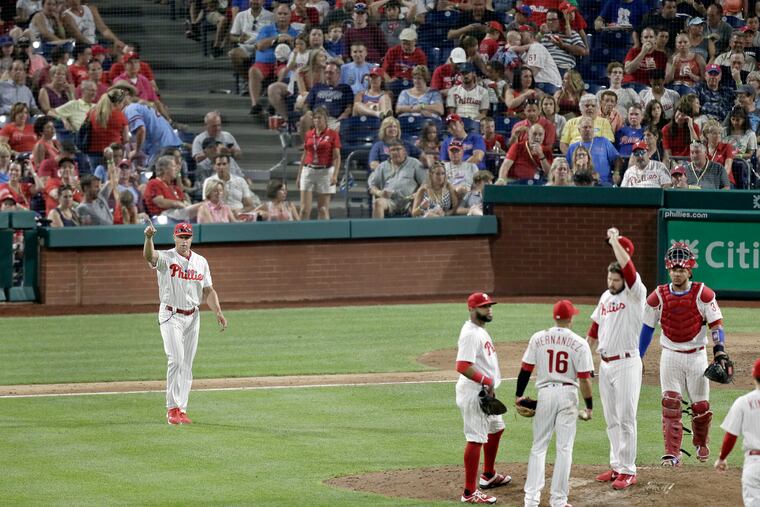 Phillies manager Gabe Kapler makes a pitching change earlier this season against Washington. More frequent changes have helped slow games down in recent years.