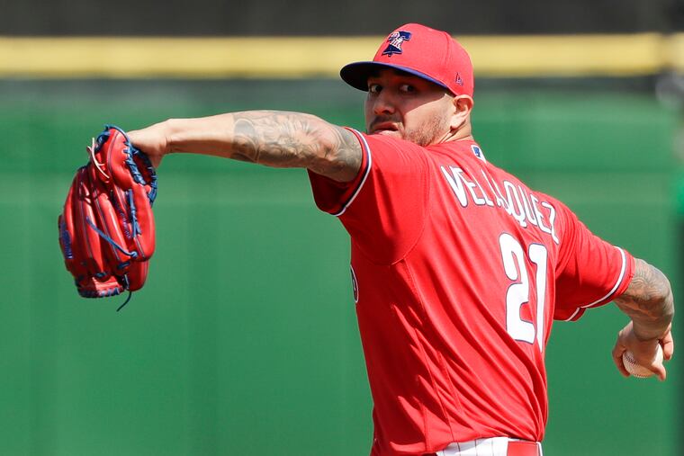 Phillies pitcher Vince Velasquez throws a warm-up pitch during a spring-training game.