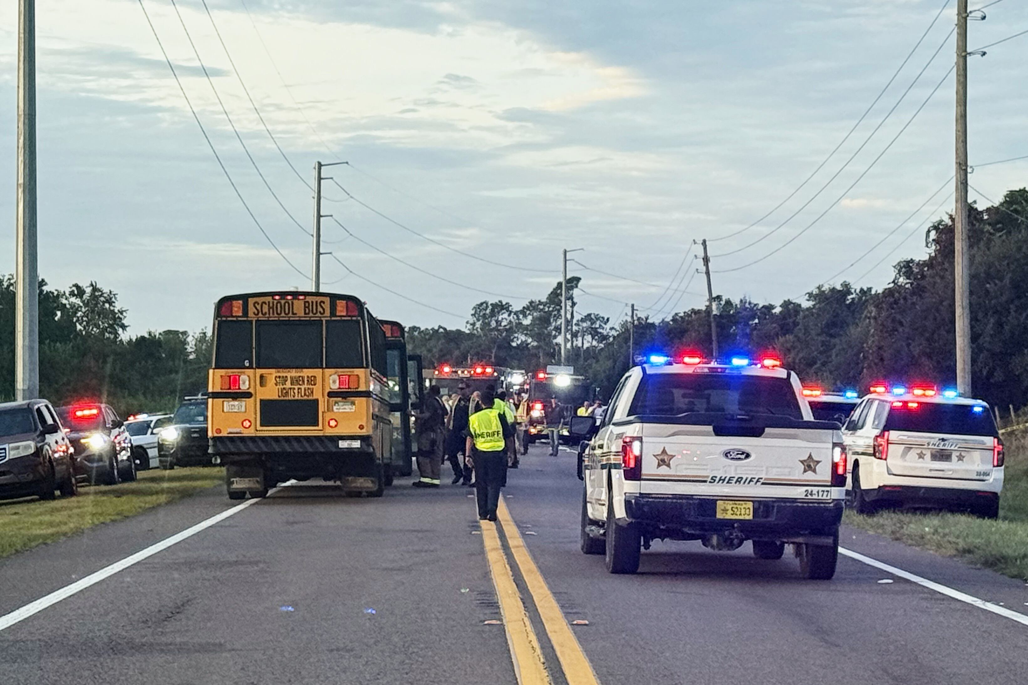 2 people killed, including a student, after Florida school bus rolls over in crash, sheriff says