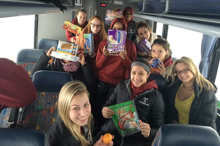 Sixteen athletes from Temple University's women's gymnastics team, three coaches and their athletic trainer have been stuck aboard the team bus on the Pennsylvania Turnpike outside Pittsburgh since 6 p.m. Friday.