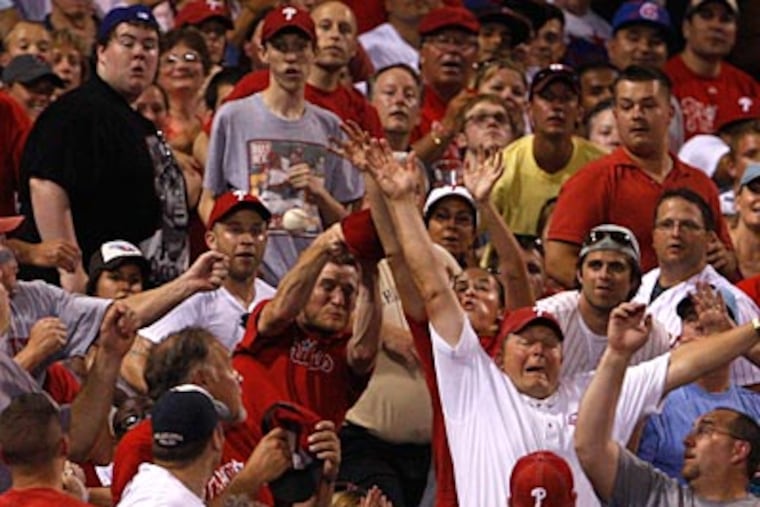 The Phils have sold out 84 straight home games, which Sam Donnellon says proves fans are front-runners. (Ron Cortes / Staff File Photo)