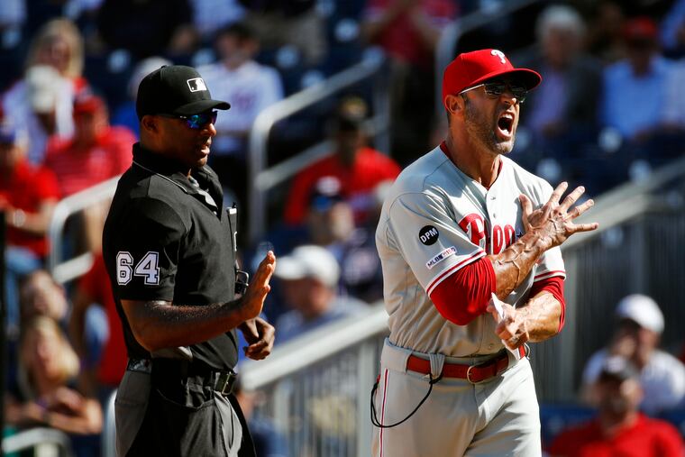 Phillies manager Gabe Kapler argues with umpire Alan Porter during the Phillies' 4-1 loss to Washington in Game 1 at Nationals Park.