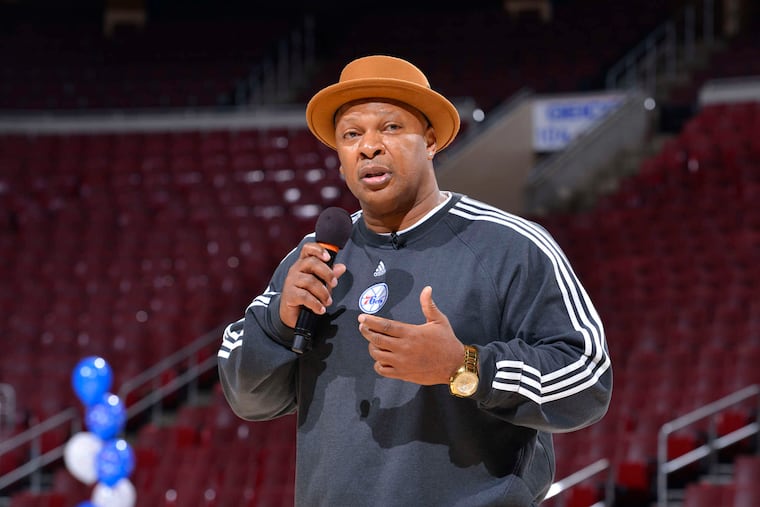 Former 76ers player World B. Free speaks at the Wells Fargo Center event for Philadelphia schoolchildren. Free has been critical of the Federal Reserve's refusal to raise interest rates.
