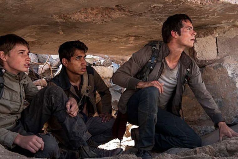 (left to right) Aris (Jacob Lofland), Winston (Alex Flores) and Thomas (Dylan O’Brien), make their way through the Scorch in "Maze Runner."
(Photo credit: Richard Foreman, Jr. SMPSP)
TM and © 2015 Twentieth Century Fox Film Corporation. All Rights Reserved. Not for sale or duplication.