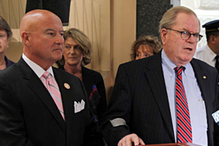 Pa. Chief Justice Ronald D. Castille (right) and Justice Seamus McCaffery in 2010. Besides raising questions about McCaffery, the report quoted Traffic Court staff as saying that the office of Democratic U.S. Rep. Bob Brady of Philadelphia often requested "special consideration" in dealing with tickets, which Brady denies. LAURENCE KESTERSON / File Photograph