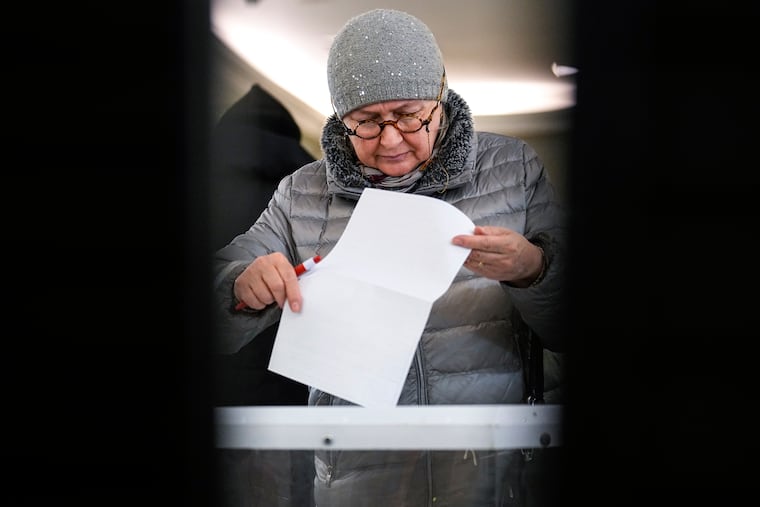 A woman casts her ballot in Moscow on Friday.