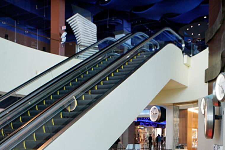 A view of an escalator at The Pier Shops at Caesars, where finance executive James Vellanti fell to his death. (Elizabeth Robertson / Staff Photographer)