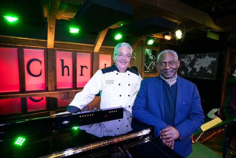 Clef Club director Lovett Hines (right) and Chris' Jazz Café owner Mark DeNinno in the Jazz Café.