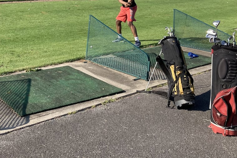 Haneef Davis, 17, got to play golf for the first time at Anchors Camp.
