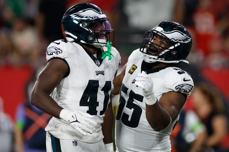 Philadelphia Eagles linebacker Nicholas Morrow (41) celebrates a two point safety in the third quarter with teammate Philadelphia Eagles defensive end Brandon Graham (55) at Raymond James Stadium in Tampa, FL on Monday, September 25, 2023.