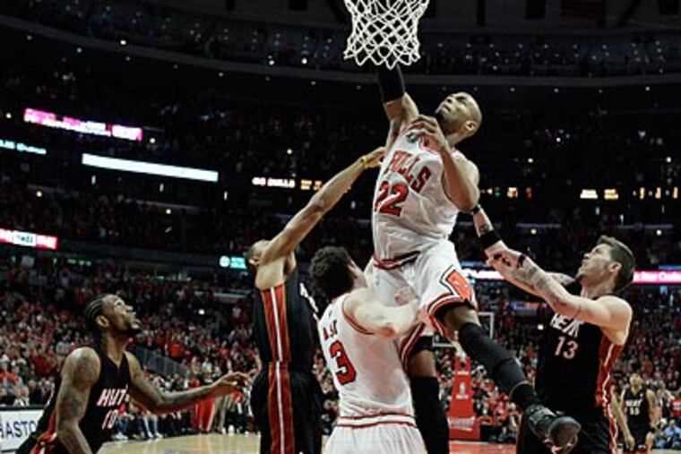 This year's NBA playoffs have been about much more than just Bulls star Taj Gibson's dunks. (Nam Y. Huh/AP)