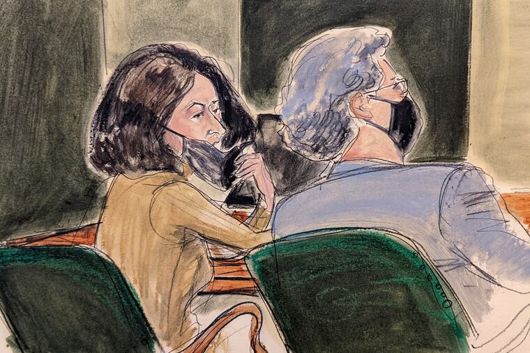 In this courtroom sketch, Ghislaine Maxwell, left, pulls down her mask to talk to one of her lawyers, Jeffrey Pagliuca, during Maxwell's sex trafficking trial, Monday, Dec. 27, 2021, in New York. (AP Photo/Elizabeth Williams)