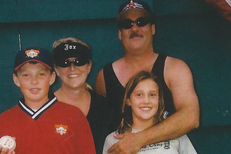 A young Rhys Hoskins with his mom, Cathy; dad, Paul and sister, Meloria.
