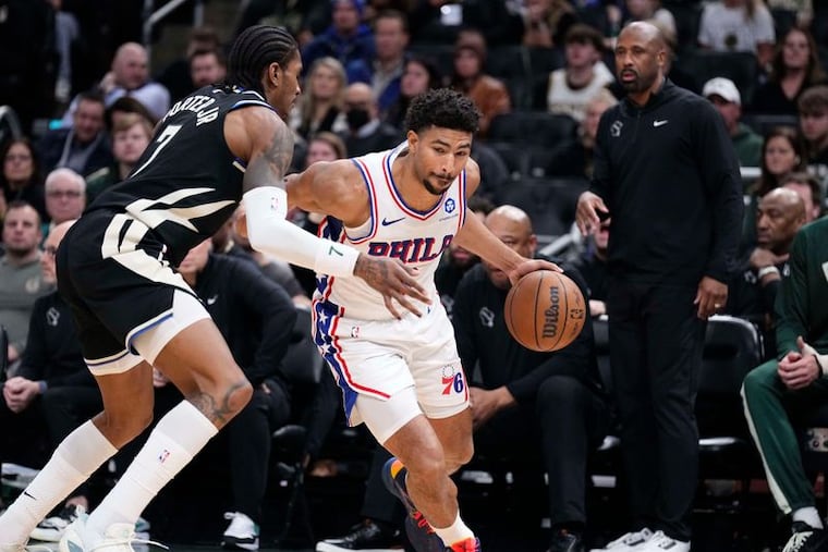 Quentin Grimes drives to the basket against Milwaukee Bucks guard Kevin Porter Jr. at Fiserv Forum on Friday.