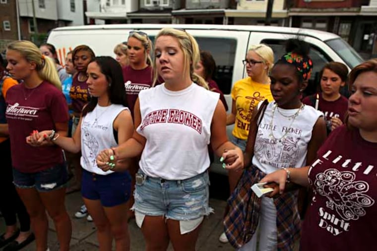 Fellow students and teachers from Little Flower High School participate in a candlelight vigil for 17-year-old Jaylin Landaverry on Wednesday July 23, 2014, at the scene of the food truck explosion on Wyoming Avenue in the Feltonville section. Landaverry died Tuesday night at Temple University Hospital from the injuries she suffered during a July 1, 2014, food truck explosion. For the Daily News/ Joseph Kaczmarek