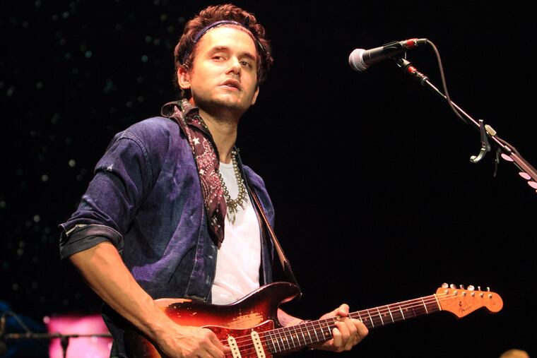 John Mayer performs in concert at the Susquehanna Bank Center on Friday, Aug. 23, 2013, in Camden, N.J. (Photo by Owen Sweeney/Invision/AP)