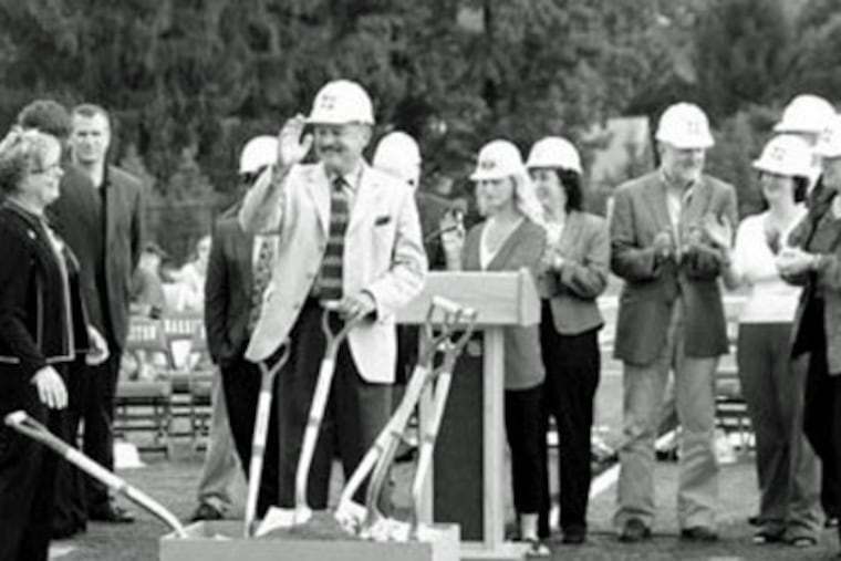 Norton Seaman (center), interim principal of Lower Merion High, presides over groundbreaking for the new Harriton High. Seaman has been retired since 1998, but collecting a pension and a salary since 2002. (The Merionite)