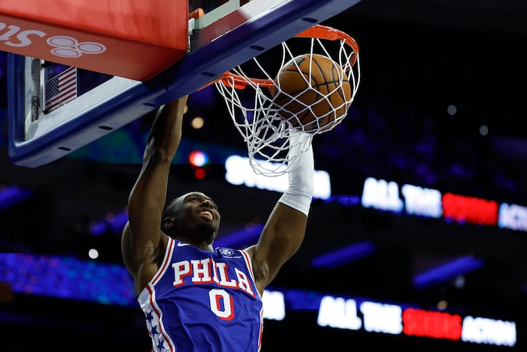Sixers guard Tyrese Maxey dunks the basketball during the first quarter against the Indiana Pacers on Monday, January 19, 2026 in Philadelphia. This weekend we celebrate America's first professional basketball game played in Philadelphia in 1898.